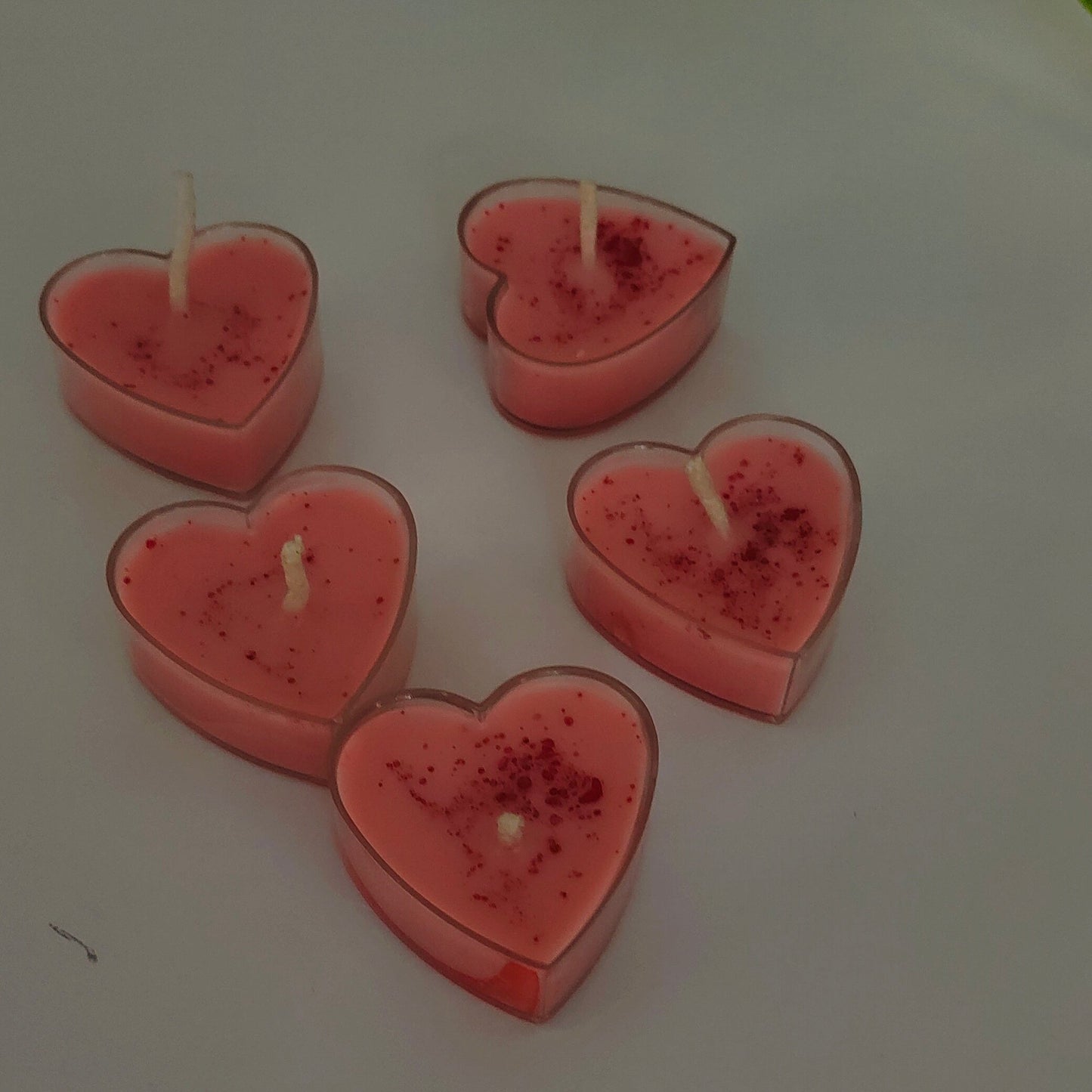 Pack of 5 Transparent Heart Candles in a beautiful red-pinkish hue with striking red patches